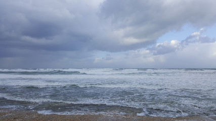 Storm, windy weather on sea shore of Mediterranean Sea, Haifa, Israel