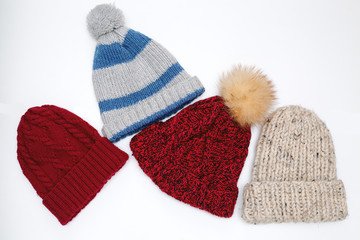 winter knitted hats on a white background