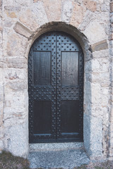 Ancient castle black wood door