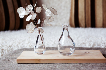 glass vase on a wooden stand