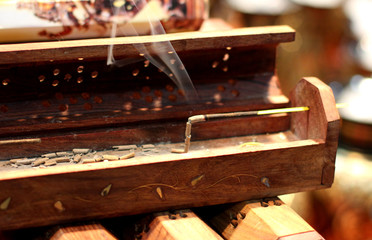 Incense stick on wooden box. Aromatherapy