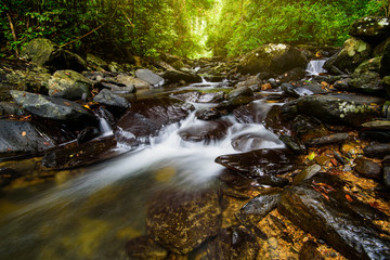 water flowing over rocks at a little falls