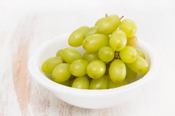 green grapes on white bowl
