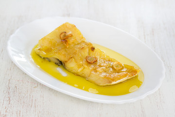 fried cod fish with garlic and olive oil