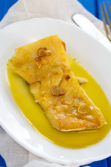 fried cod fish with garlic and olive oil