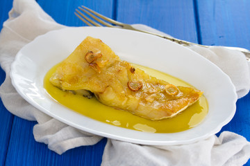fried cod fish with garlic and olive oil