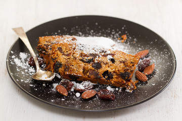 English cake with dry fruits on plate