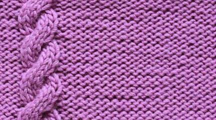 lilac background from knitted knitted fabrics with braids and rows