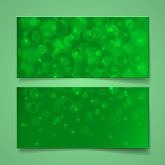 Green banners with bokeh and shamrock leaves. St. Patrick day cards. Vector illustration