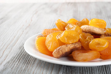 Dried fruits in white plate
