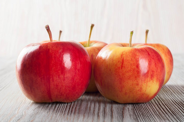 Apples on a wooden background.