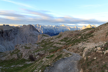 Naklejka na ściany i meble Footpath and Sexten Dolomites mountain panorama in South Tyrol, Italy
