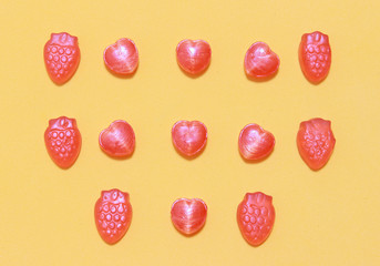 Hearts candy on orange background for valentine