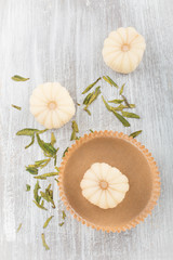 Green tea mochi - Japanese mini rice cake. Brown plate on the bottom. 