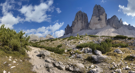 Mountain path leading under the Tre Cime di Lavaredo / Drei Zinnen, Dolomites, Italy