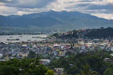 Fototapeta na wymiar Ambon City, Indonesia. Ambon City on Ambon Island boasts excellent transport connections and facilities and make it a gateway to Maluku, and its colonial forts, green hills and pleasant beaches.