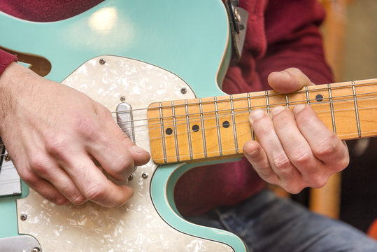 Playing Electric Guitar