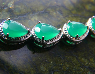 Female bracelet on a dark background