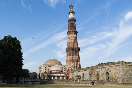 Qutub Minar and Alai Darwaza inside Qutb complex in Mehrauli, Delhi, India, Asia.