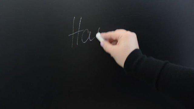 We write on a board the phrase happy days.