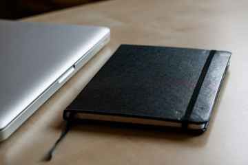 Travel Diary and Laptop