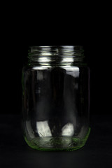 empty jar on black background