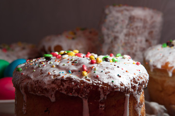 Easter cakes in the glaze and candy strewing, close-up