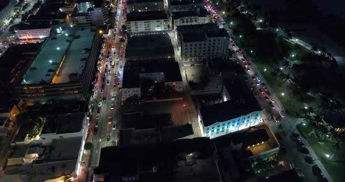 Aerial drone video of neon lights in Miami Beach at night 4k 24p