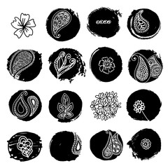 Henna tattoo decorative floral motifs with grungy black ink spots