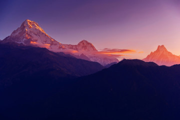 Fototapeta na wymiar View of Annapurna and Machapuchare peak at Sunrise from Poon Hill, Nepal.