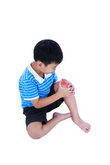 Full body of child injured at knee. Isolated on white background