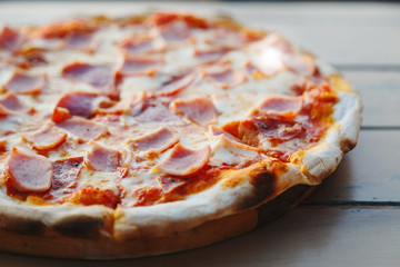 Pizza on the wood plate