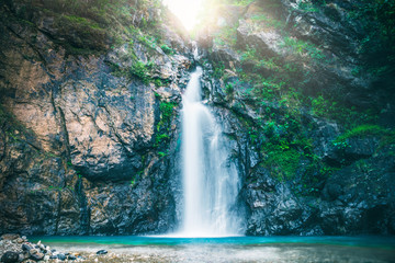 Fototapeta na wymiar Natural background waterfall. jogkradin waterfall
