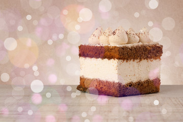 Delicious tasty homemade cakes with bokeh light background