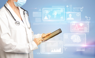 Female doctor with tablet