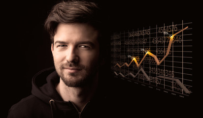 Happy businessman with a growing graph