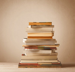 A stack of books with vintage background