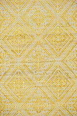 old colorful thai handcraft peruvian style rug surface old vintage torn conservation Made from natural materials Chemical free close up.