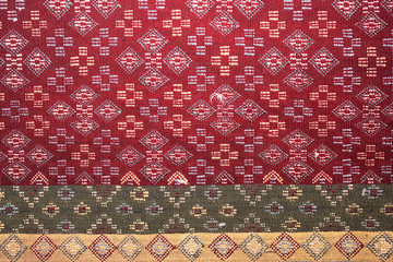 colorful thai silk handcraft peruvian style rug surface old vintage torn conservation Made from natural materials Chemical free close up silk background silk texture