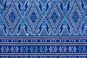 colorful thai silk handcraft peruvian style rug surface old vintage torn conservation Made from natural materials Chemical free close up silk background silk texture