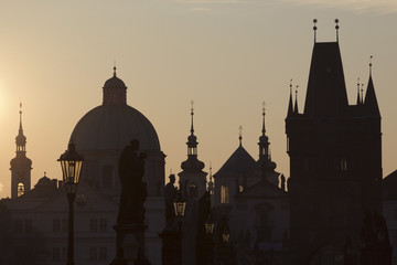 Fototapeta na wymiar Prague, the silhouettes of the Old City early in the morning