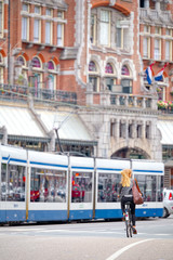 Girl on bicycle in Amsterdam