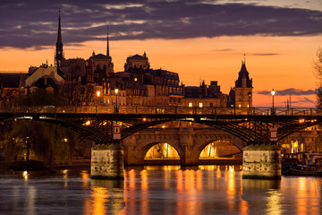 Sunrise on Ile de la Cite with view on the Pont des Arts, Pont Neuf and the Seine River. 1st Arrondissement, Paris, France