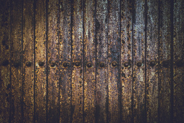 Texture background Old rusted iron gate fold.