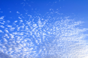 Fototapeta na wymiar Blue sky background with white clouds, rain clouds on sunny summer or spring day.