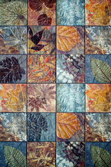 Fototapety  Old wall ceramic tiles patterns handcraft from thailand parks public.