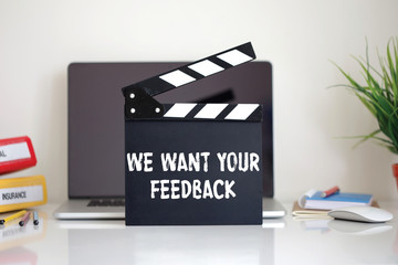 Cinema Clapper with We Want Your Feedback word