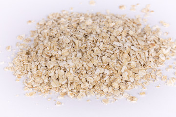 Closeup of oatmeal isolated on white.