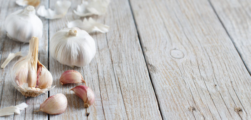 Organic garlic on wooden table