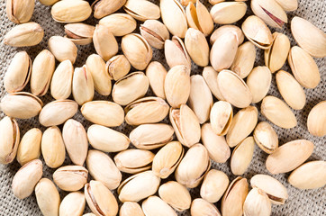 Top view of a lot of salty pistachios